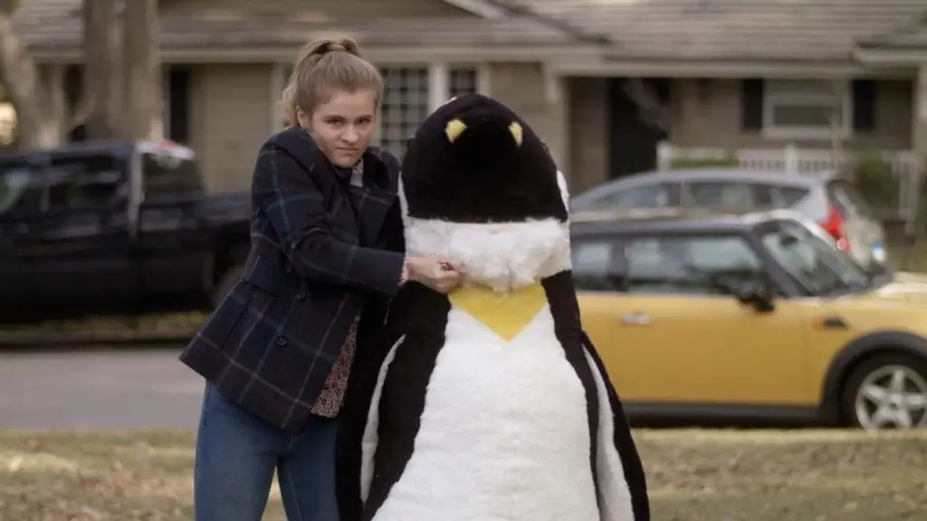 Jenna Boyd as Paige Hardaway in Netflix’s Atypical, destroying a giant stuffed penguin