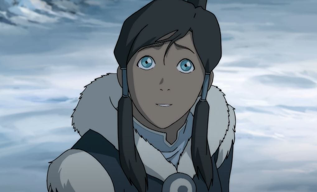 Hopeful Korra, smiling slightly, looking up while in her Water Tribe outfit