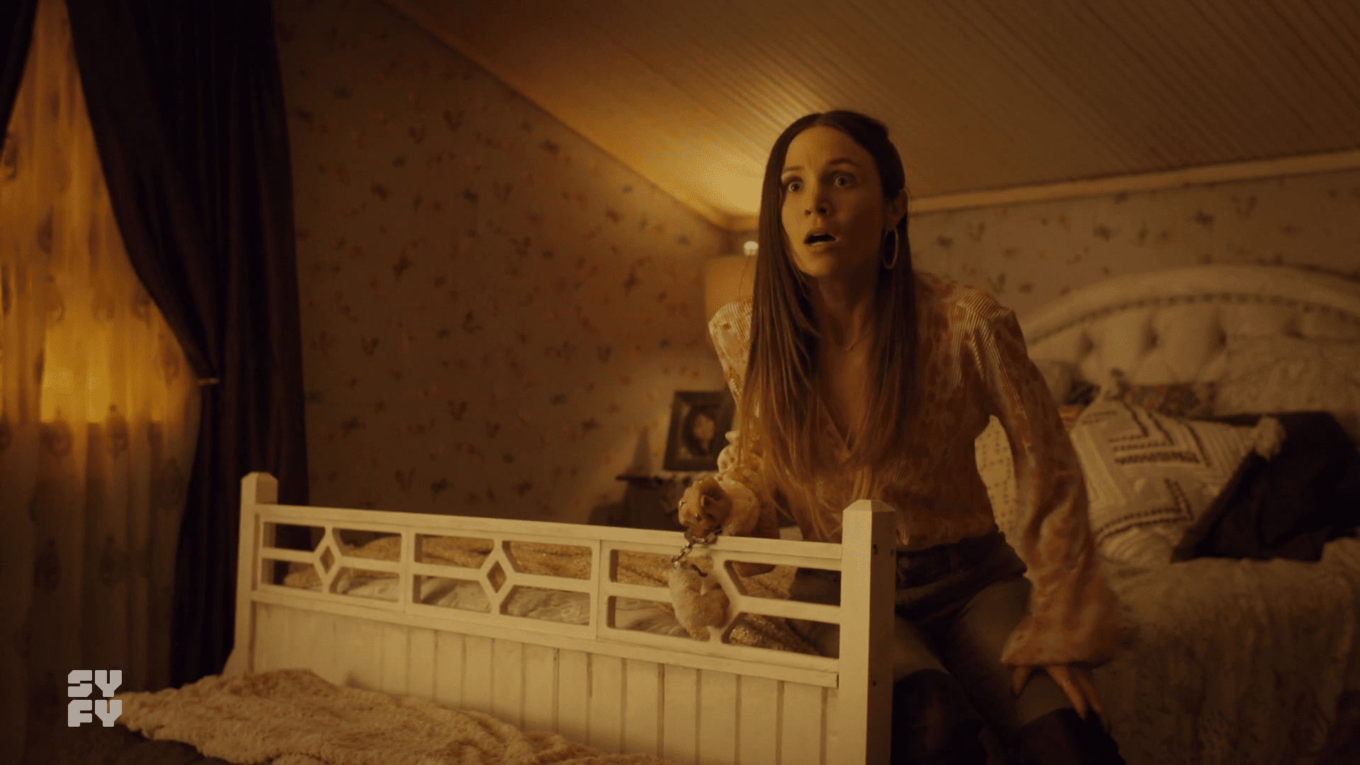Waverly handcuffed to the bed, in a not fun way.