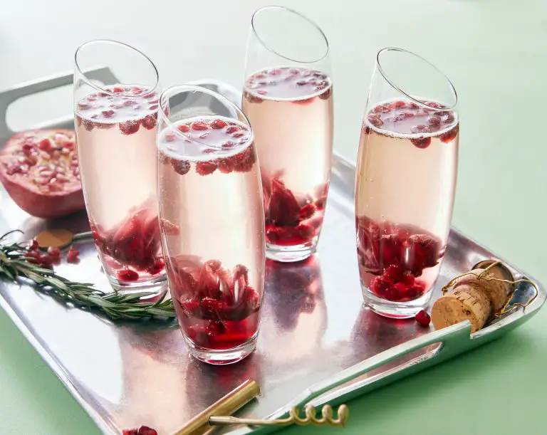champagne flutes with pomegranate drink