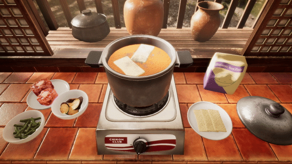 gif of ingredients moving into a pot of broth for food