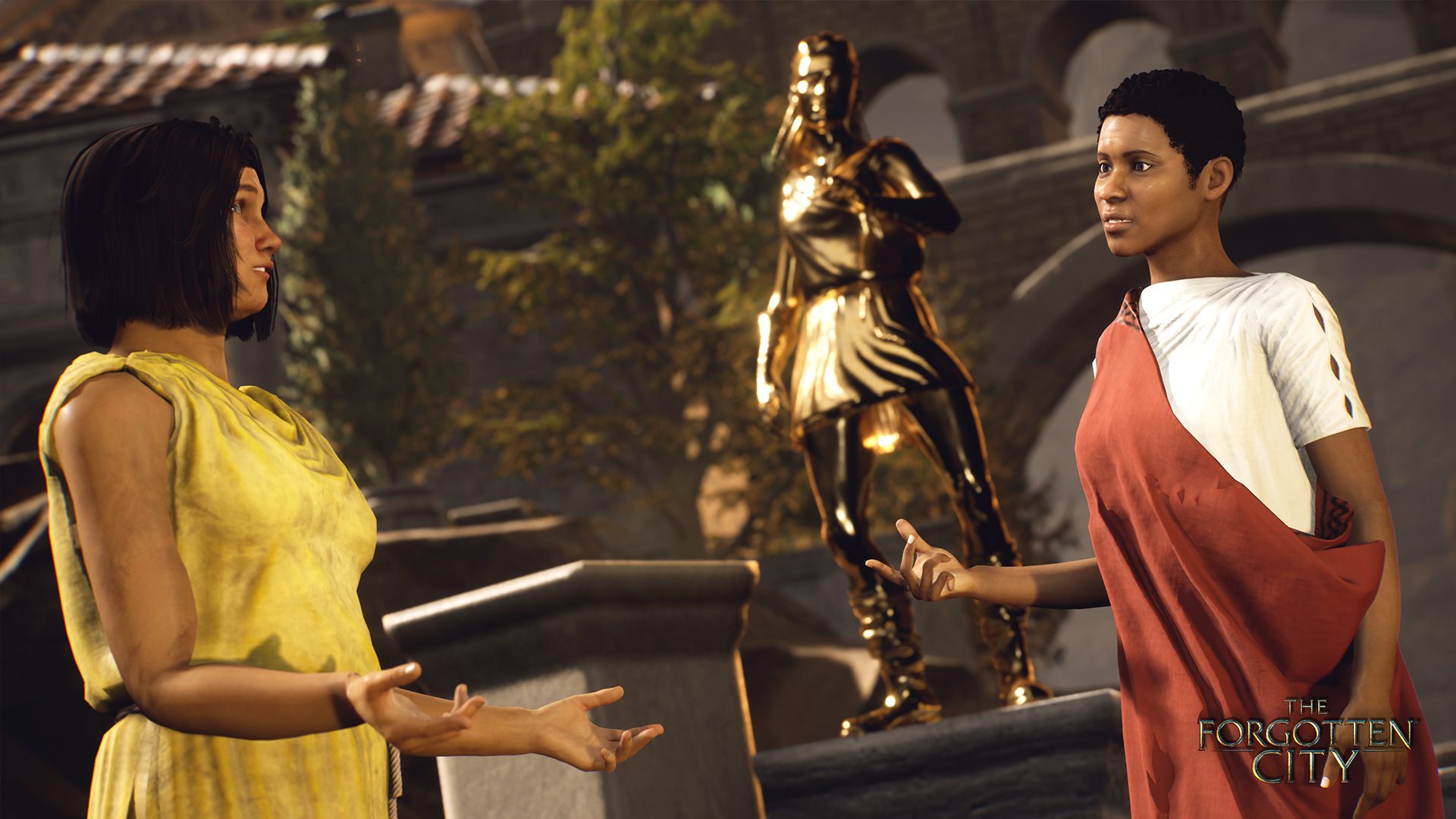 Two characters in Roman dress stand talking in front of a golden statue of a woman who looks to be in pain.