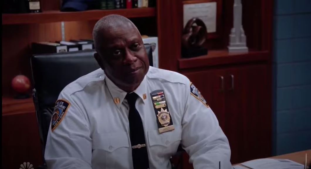 Captain Holt smiling from the Brooklyn Nine-Nine premiere