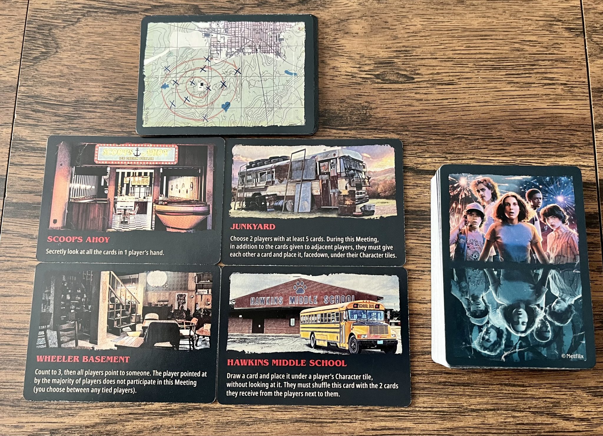 Stranger Things: Attack of the Mind Flayer card backs and front
