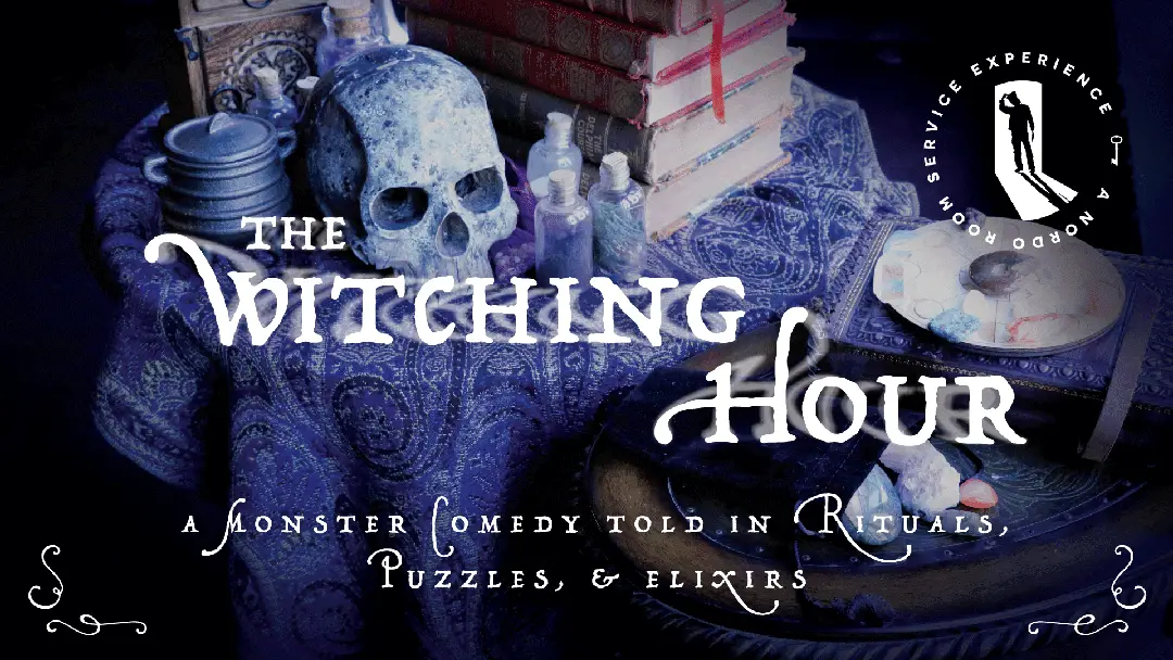 A purple & blue hued image of a witch's altar on a table, centering on a human skull. Large text reads, "The Witching Hour." Subtext reads "A Monster Comedy Told in Rituals, Puzzles, & Elixirs."