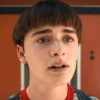 Will Byers stares ahead with a sad expression