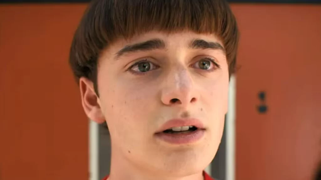 Will Byers stares ahead with a sad expression