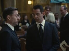 Roman and Kendall speaking at a funeral from Succession