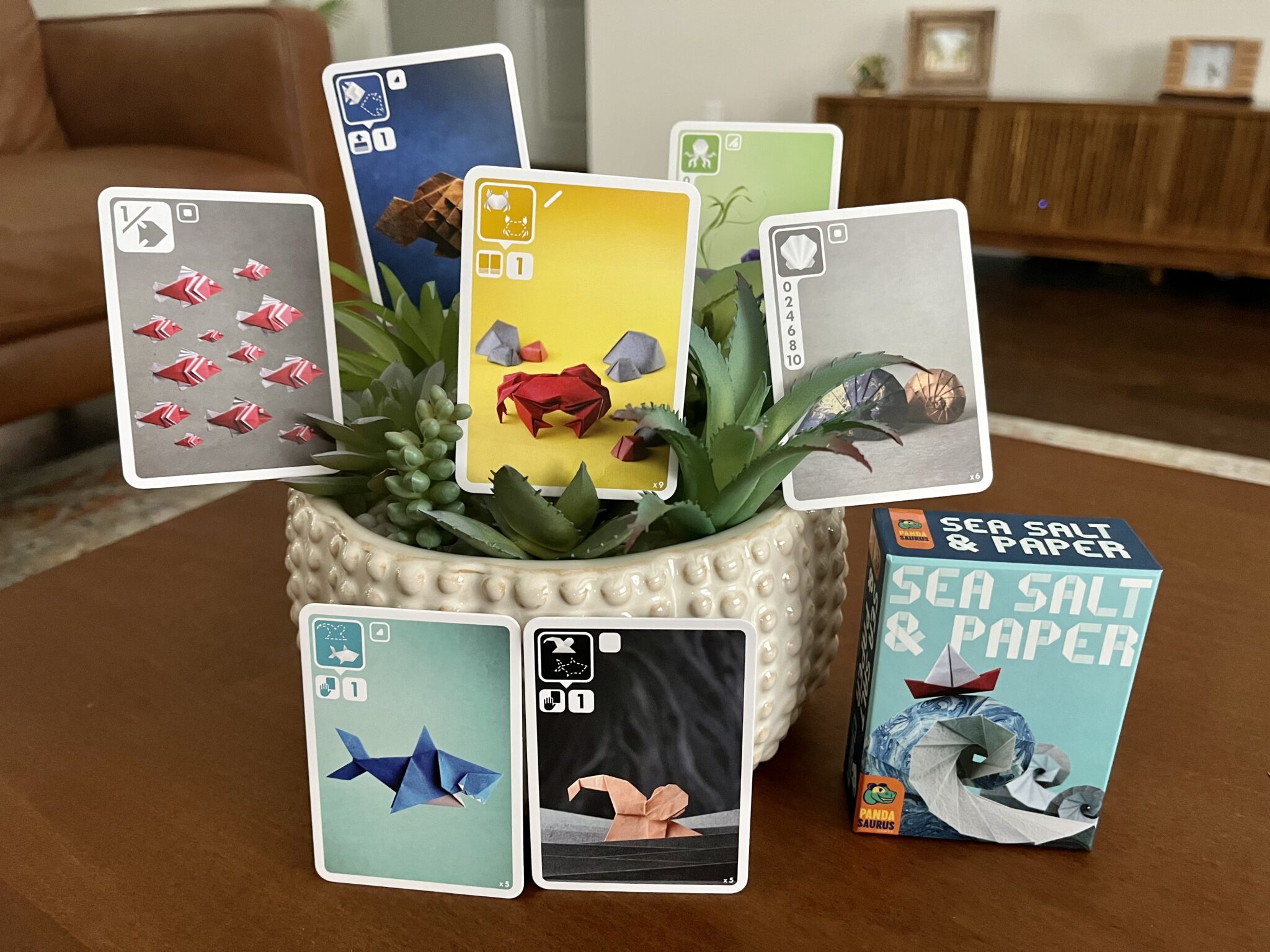 'Sea Salt & Paper' Mixes Relaxation, Strategy, and Unique Origami-Themed Art 7 Sea Salt & Paper on the coffee table