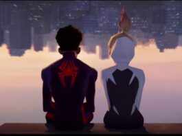 Miles and Gwen sitting upside down and looking out at the city