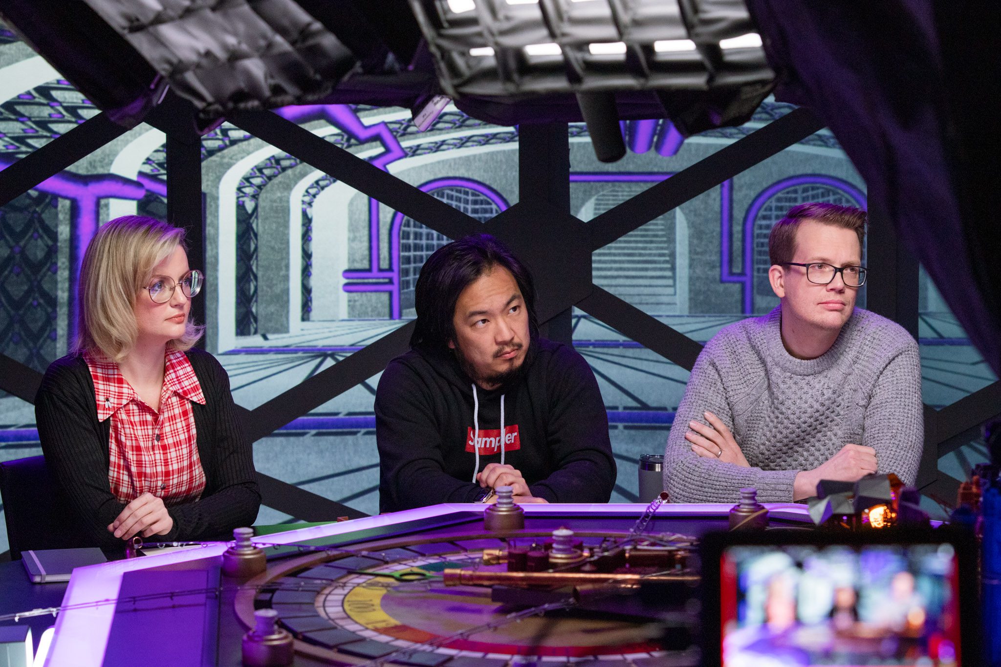 (from left to right) Siobhan Thompson, Freddie Wong, and Hank Green on the set of Dimension 20's Metropolis