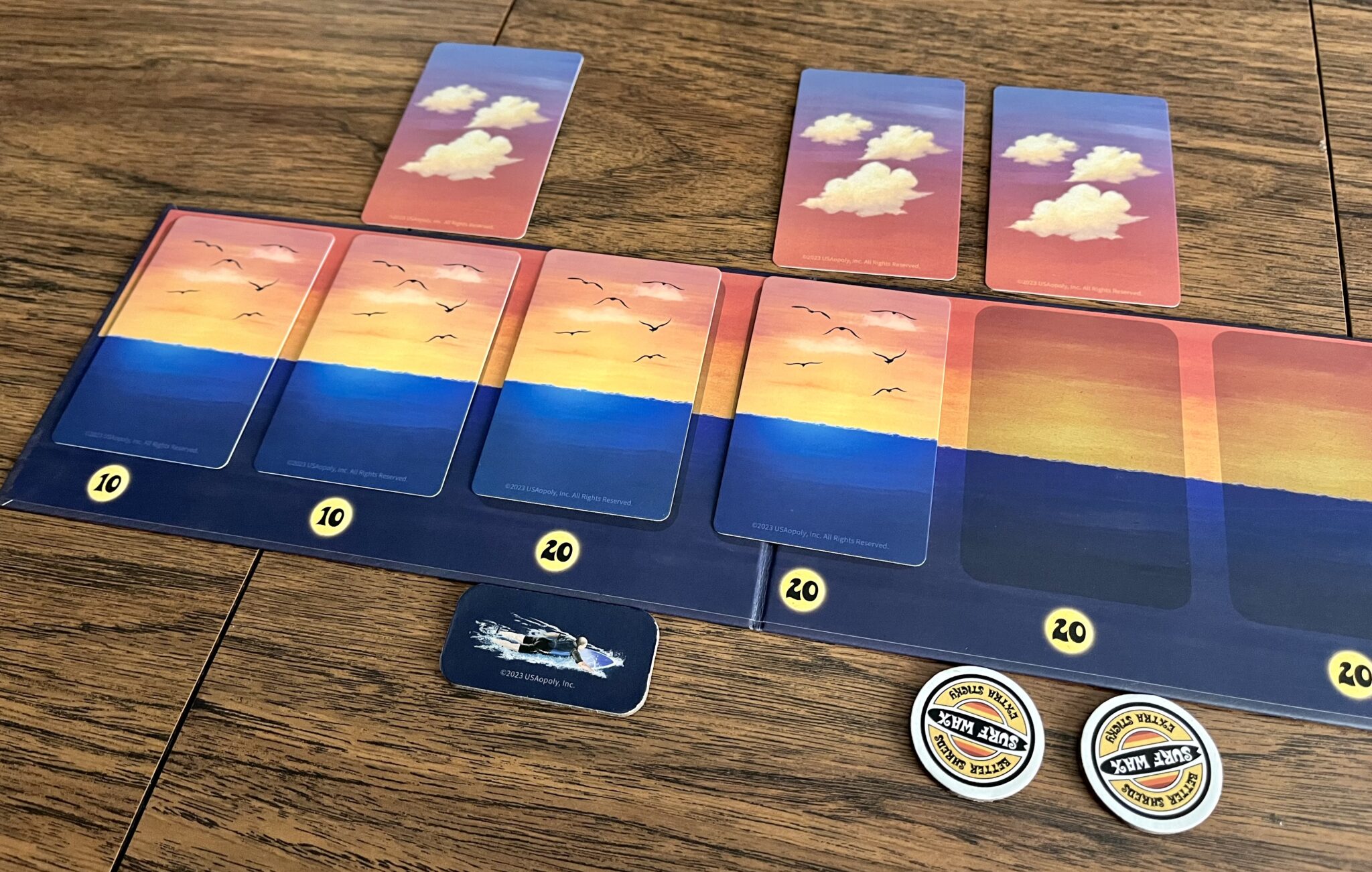 Paddle Out & Hang Ten! In 'The Perfect Wave' 3 The Perfect Wave player board placing card face down