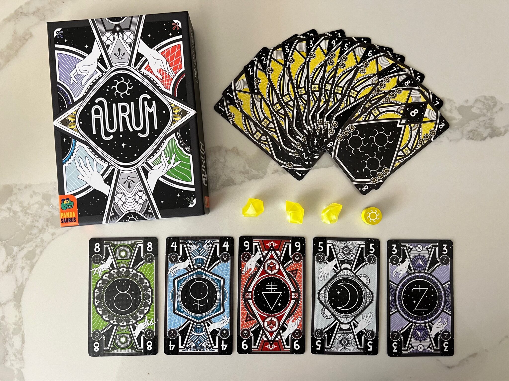 Test Your Trick Taking Mettle And Find Something Precious In 'Aurum' 1 Aurum box and contents