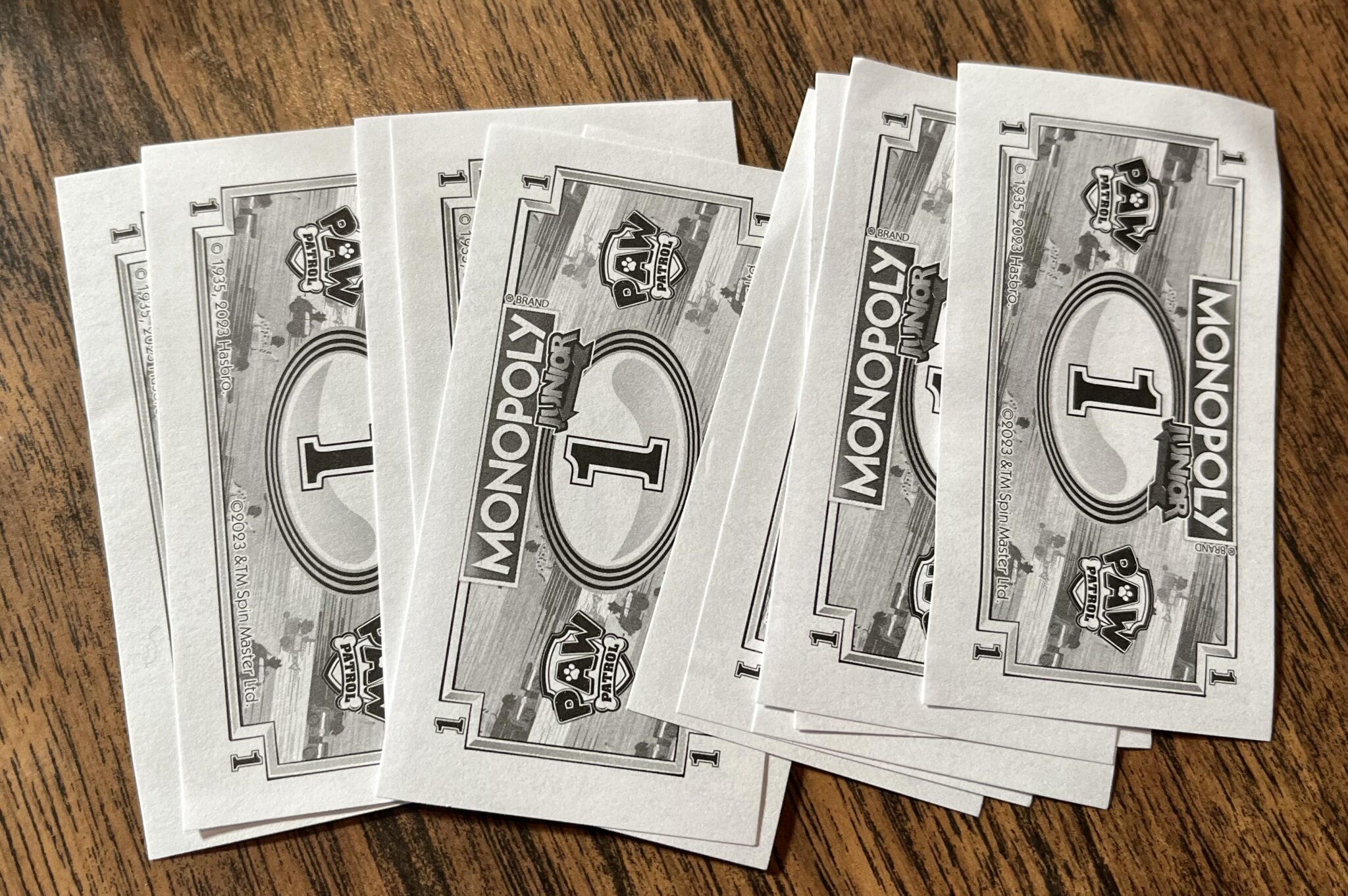 'Monopoly Junior: Paw Patrol' Was A Surprise Hit For My Kids 2 Monopoly Junior: Paw Patrol 1 dollar bills
