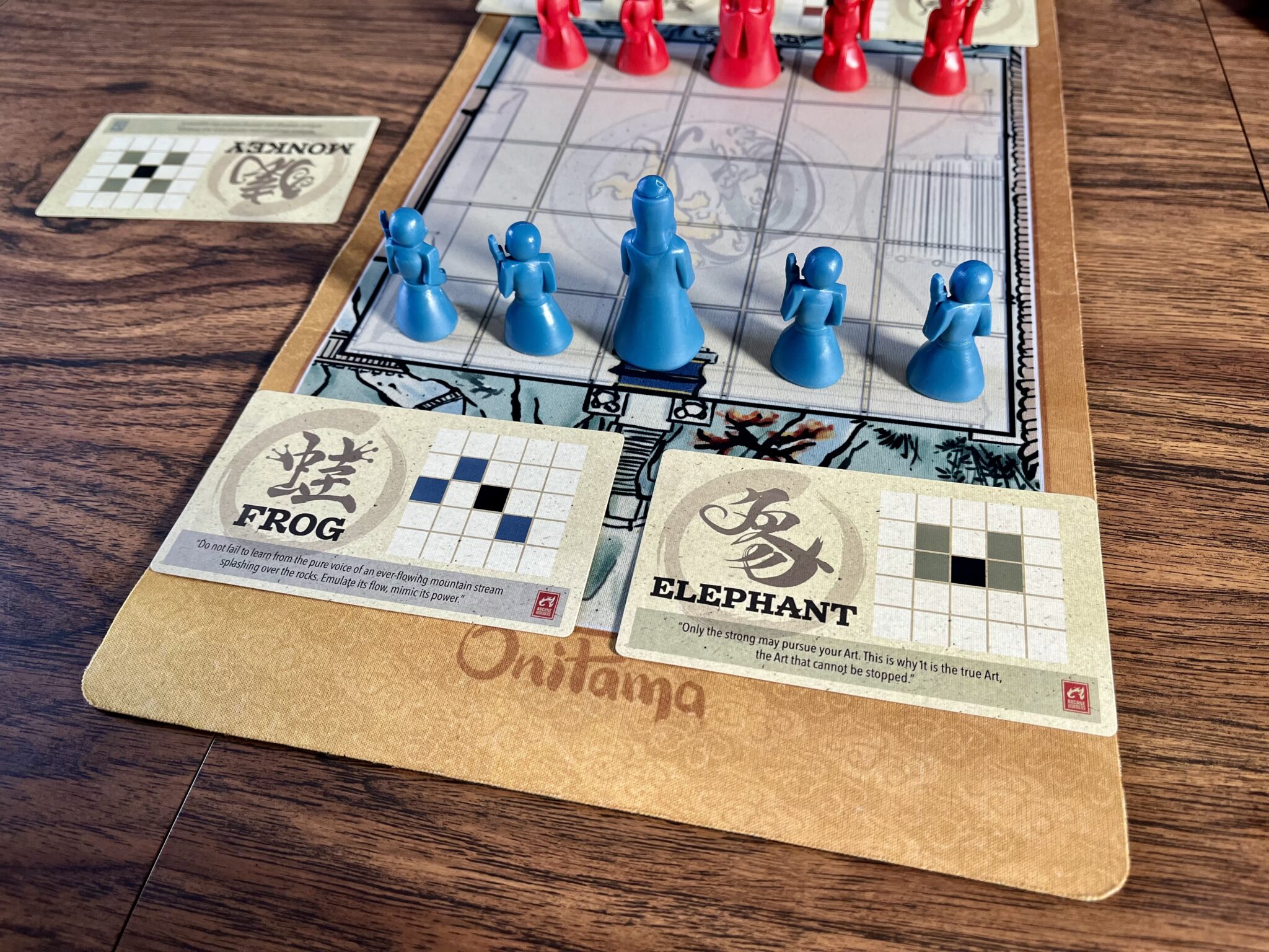 Onitama with player setup and 2 movement cards