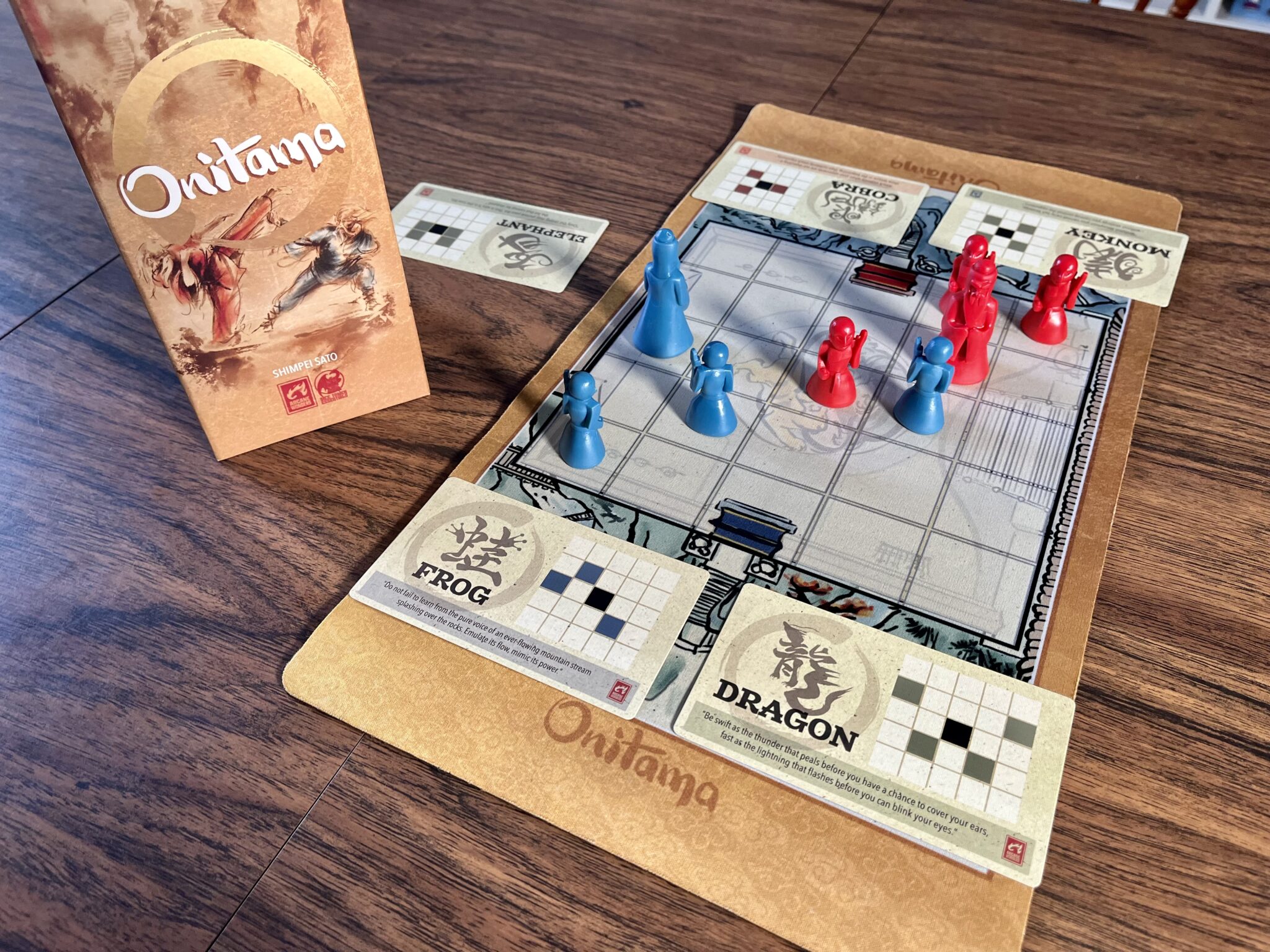 Onitama with all components on the table setup and played