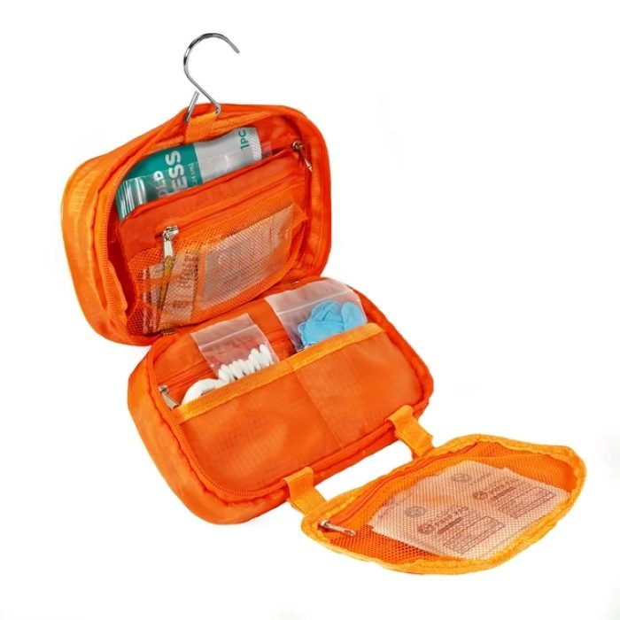 orange first aid kit open to show contents
