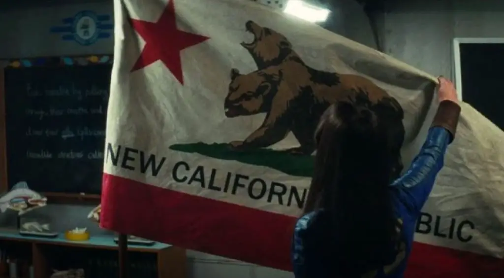Lucy unfurls a New California Republic flag from Fallout