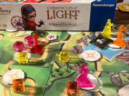 Chronicles of Light: Darkness Falls box and components set up