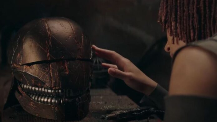 Osha touches Qimir's helmet from The Acolyte