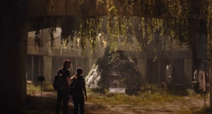 Ellie and Joel stand before a space shuttle in The Last of Us