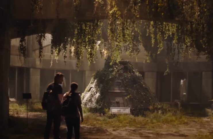 Ellie and Joel stand before a space shuttle in The Last of Us