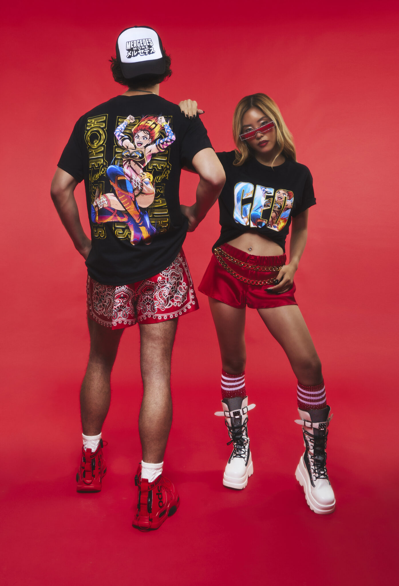 New Crunchyroll Fashion Collab Turns Mercedes Moné Into Flashy Anime Hero 2 Meteora shirt paired with Mercedes Moné trucker hat