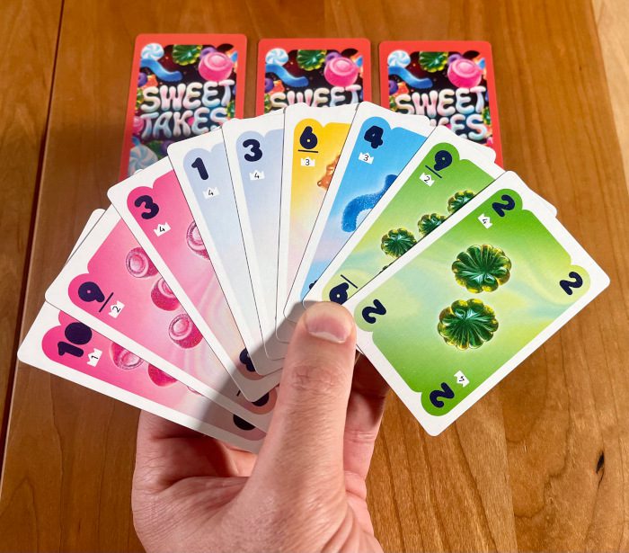 Sweet Takes hand of 9 cards and 3 cards special stash